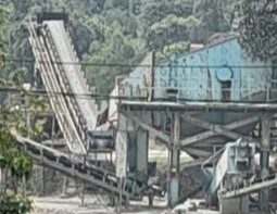 Photo of a working stone quarry and aggregate crusher plant